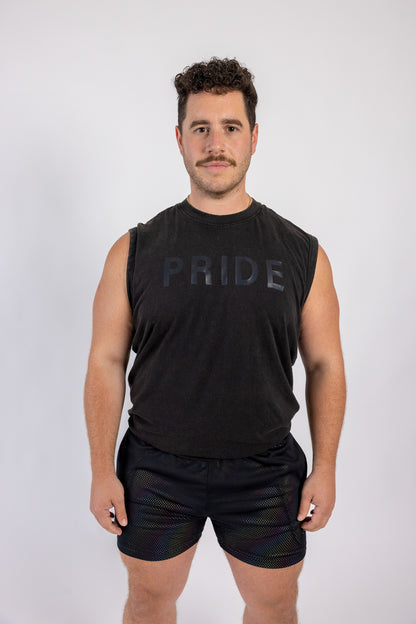Man wearing a black sleeveless shirt with 'PRIDE' text on a white background