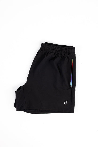 Close up of rainbow gradient pocket detail on black Andy Prism Shorts