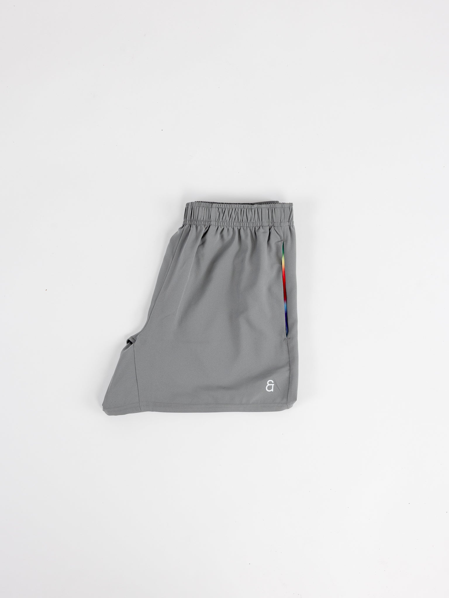 Close up of rainbow gradient pocket detail on Andy Prism Shorts.