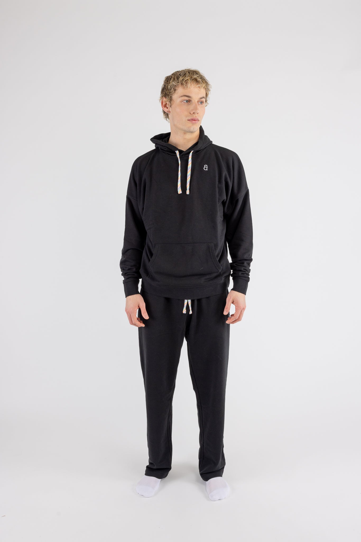 Man wearing the Arco Oversized Hoodie by ANDY