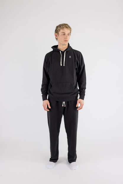 Man wearing the Arco Oversized Hoodie by ANDY