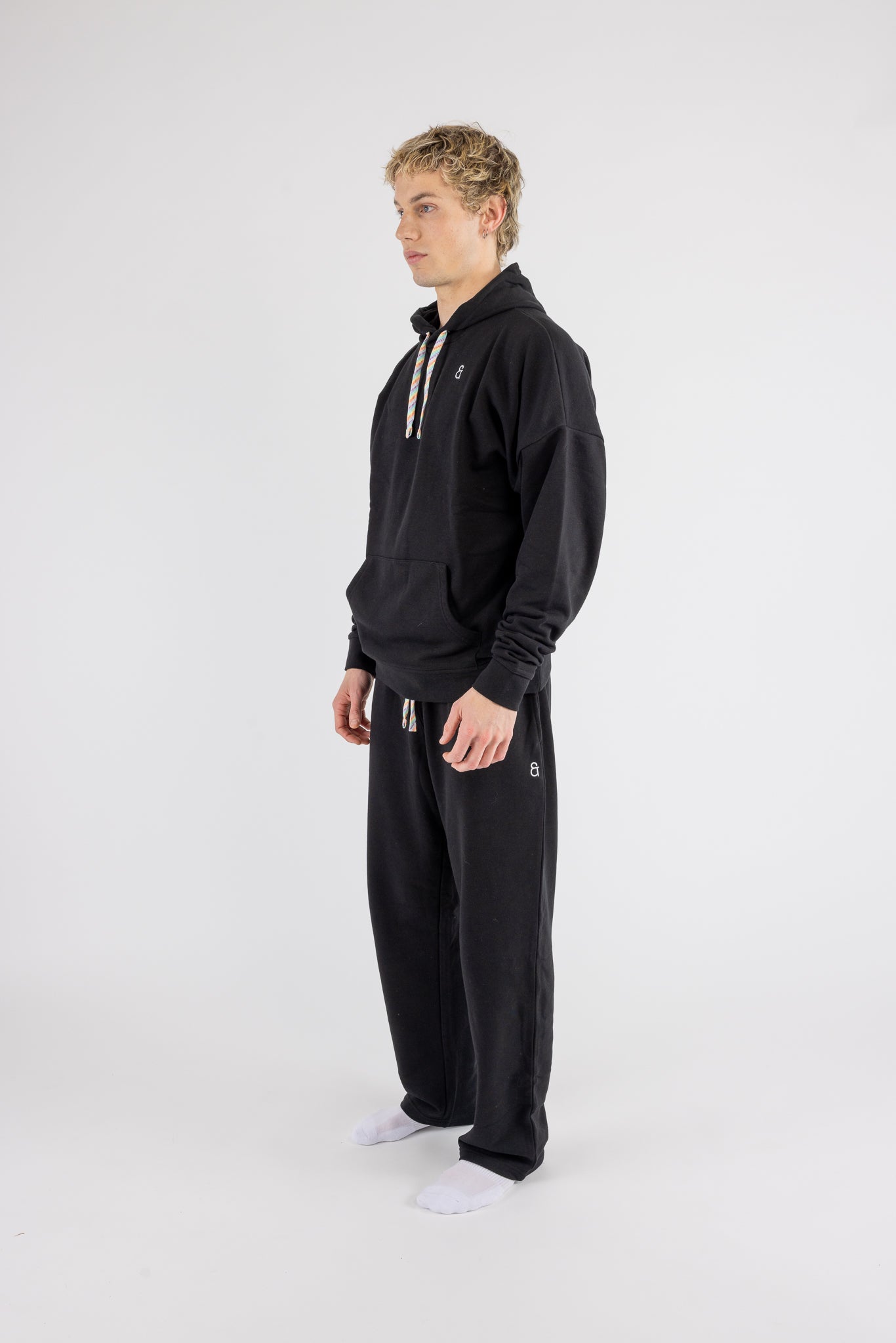 Man wearing the Arco Oversized Hoodie by ANDY