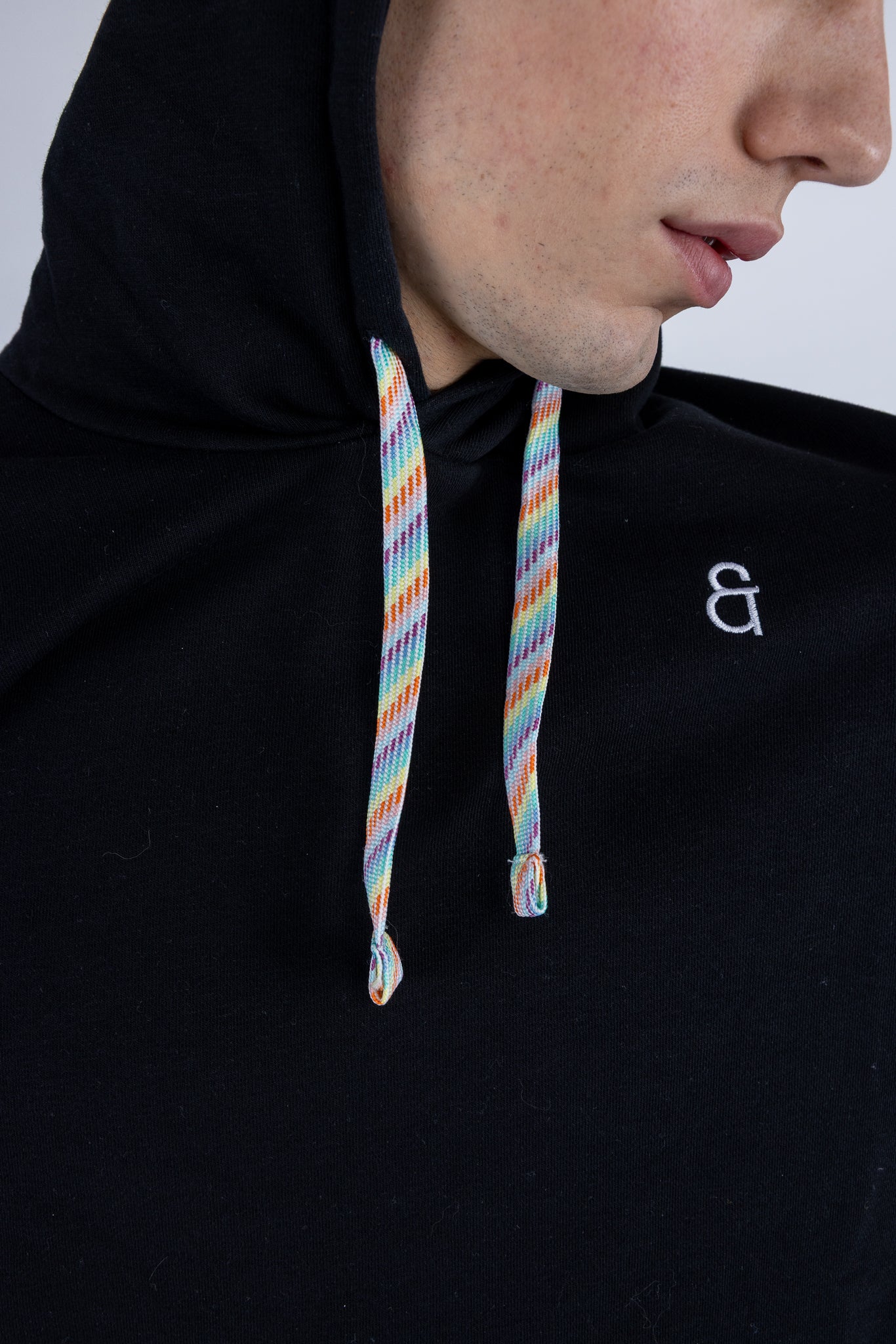 Rainbow draw strings on the Arco Oversized Hoodie by ANDY