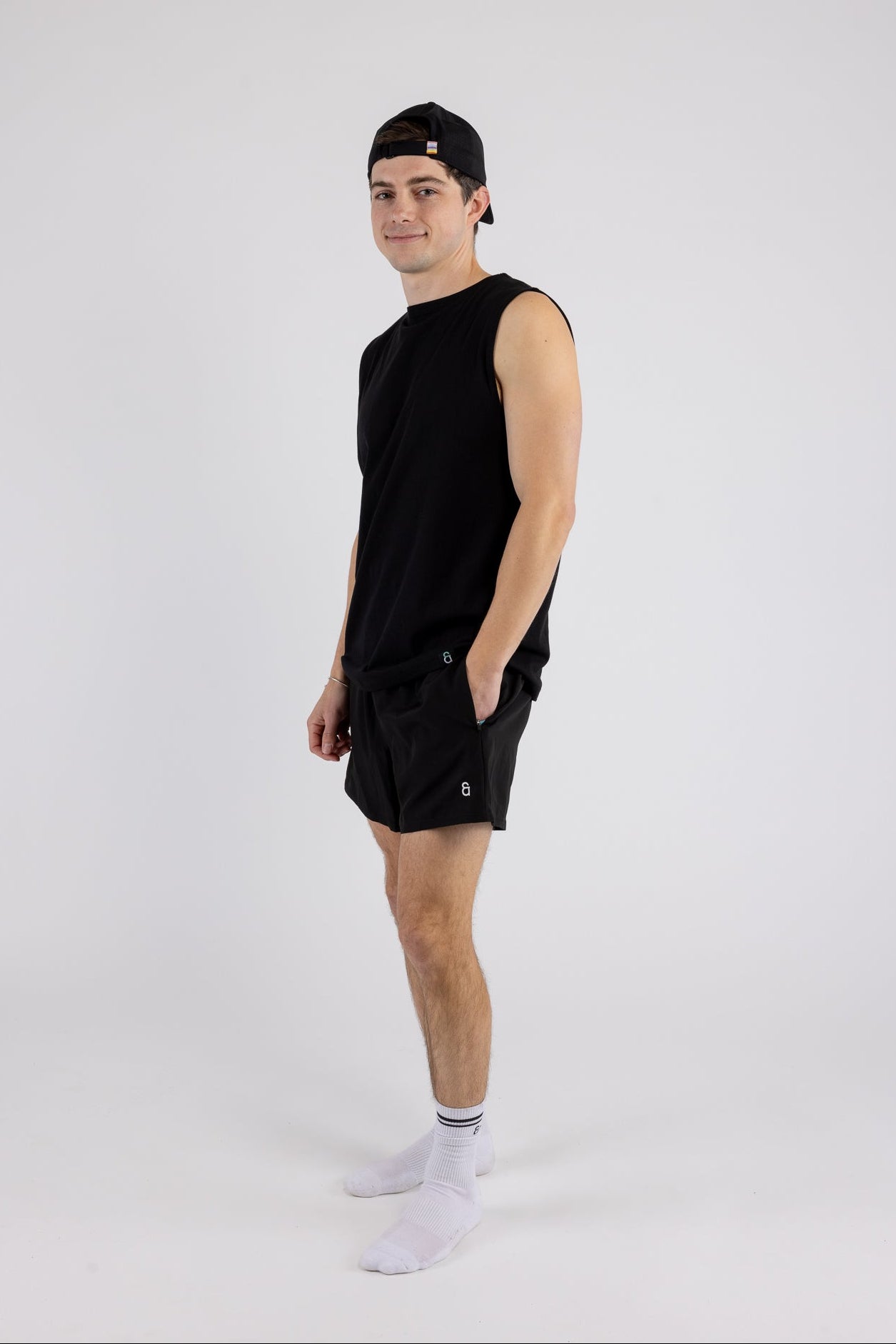 Man wearing Gym Trucker Hat and Chroma Tank Top by ANDY