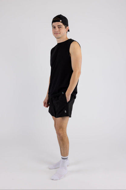 Man wearing Gym Trucker Hat and Chroma Tank Top by ANDY