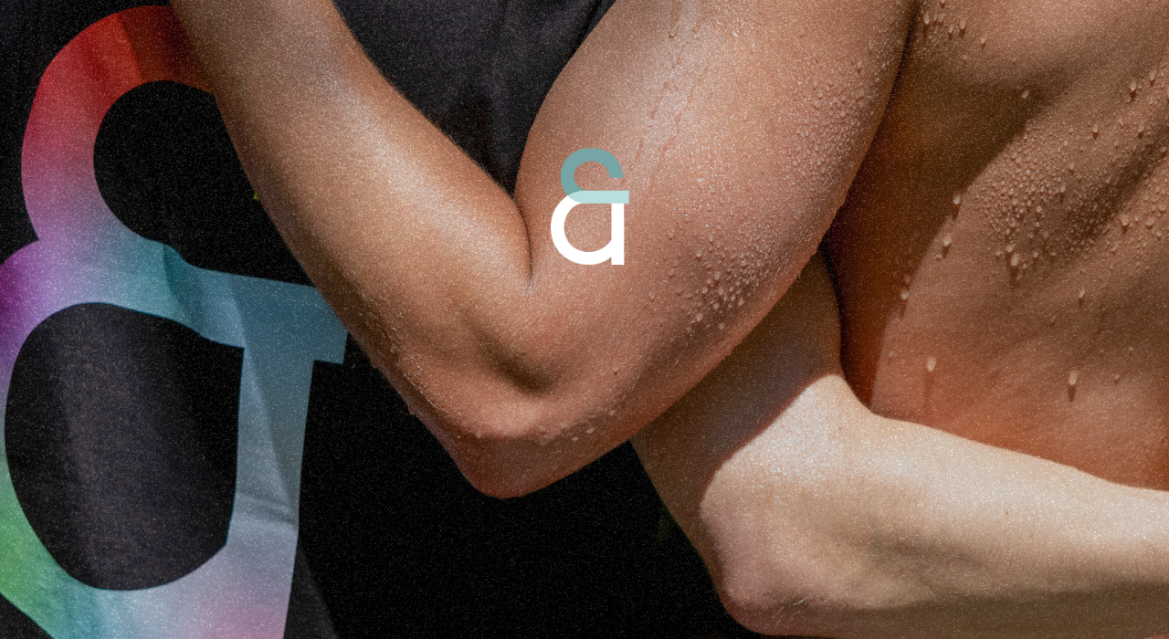 Close-up of a person's arm with a brand logo in the corner